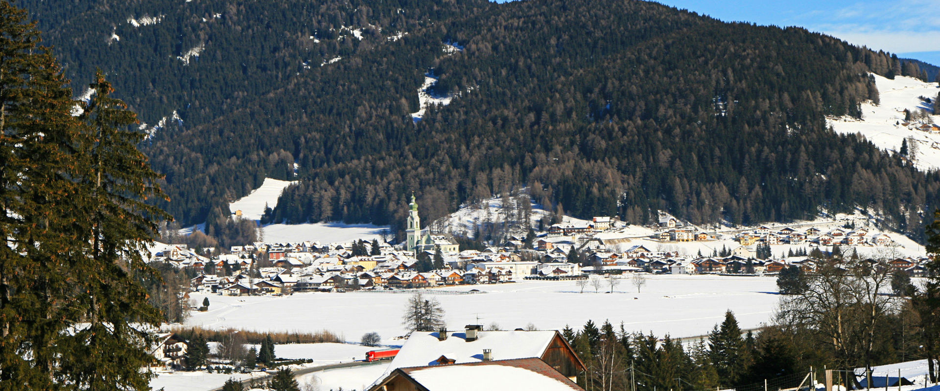 Toblach View of Toblach with parish church in winter